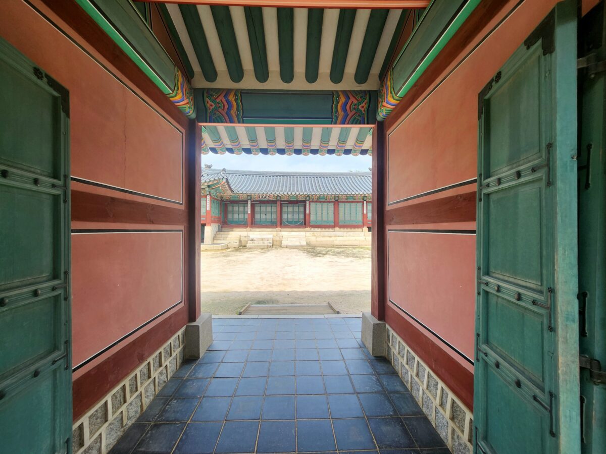 MBTI and timing — Gyeongbokgung palace gate open to courtyard, the decision that keeps waiting