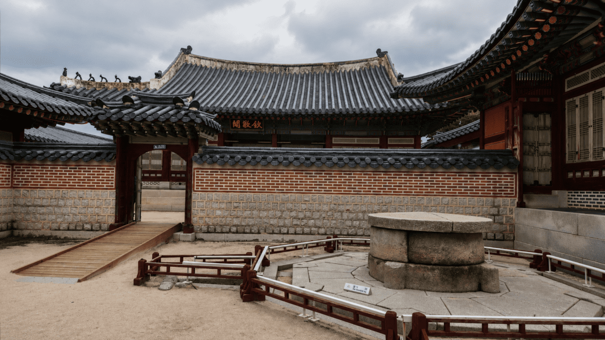 how to use K-Saju — Gyeongbokgung Palace courtyard with stone sundial base, structural limits and possibilities, Seoul