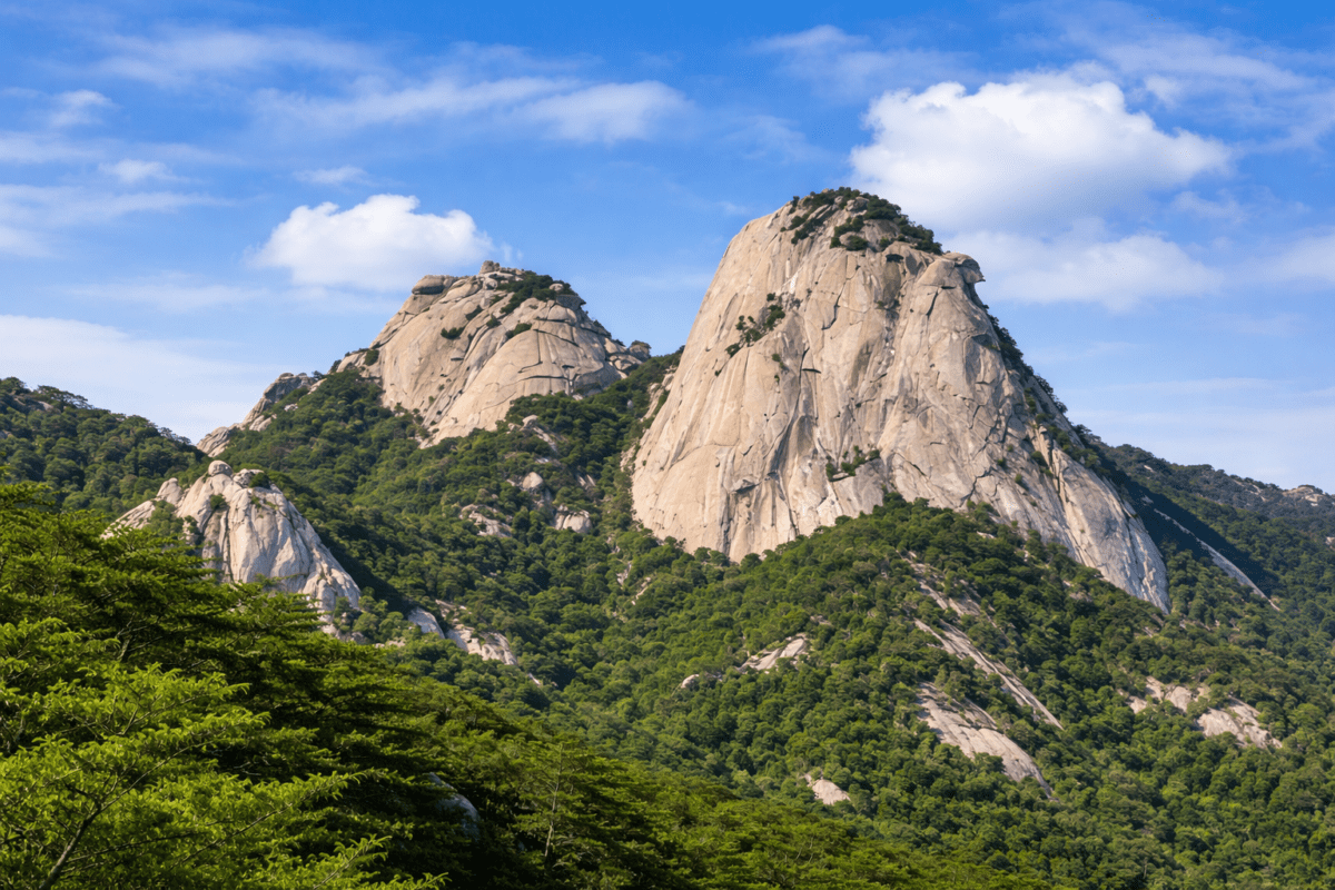 Seoul mountains five elements — Bukhansan granite peaks rising above Seoul forest