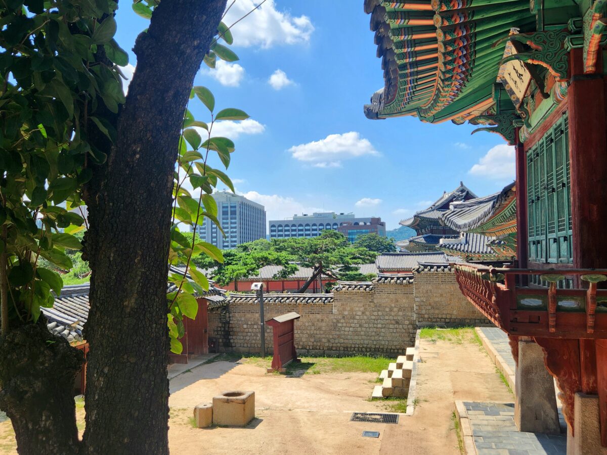 Gwanaksan hiking — traditional Korean palace courtyard with modern Seoul skyline