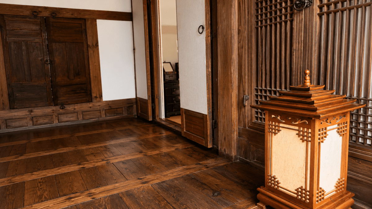Hanok wooden floor and lantern interior — yin yang korean astrology structural shift in K-Saju