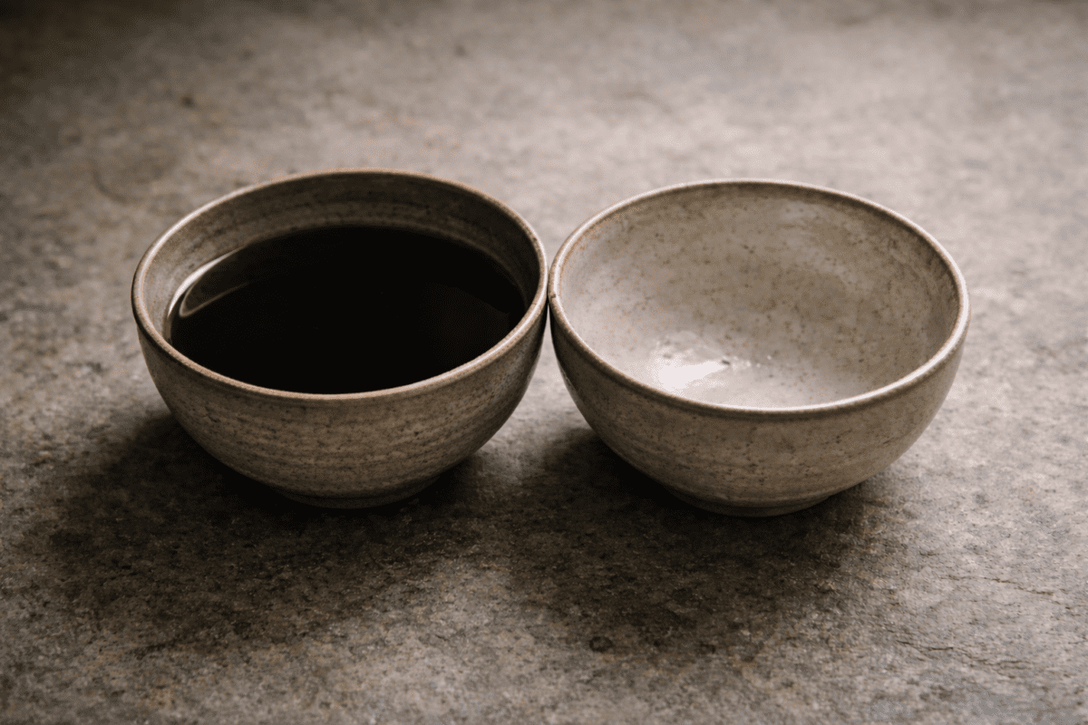 yin yang attraction in K-Saju — two ceramic bowls full and empty showing opposite directional forces