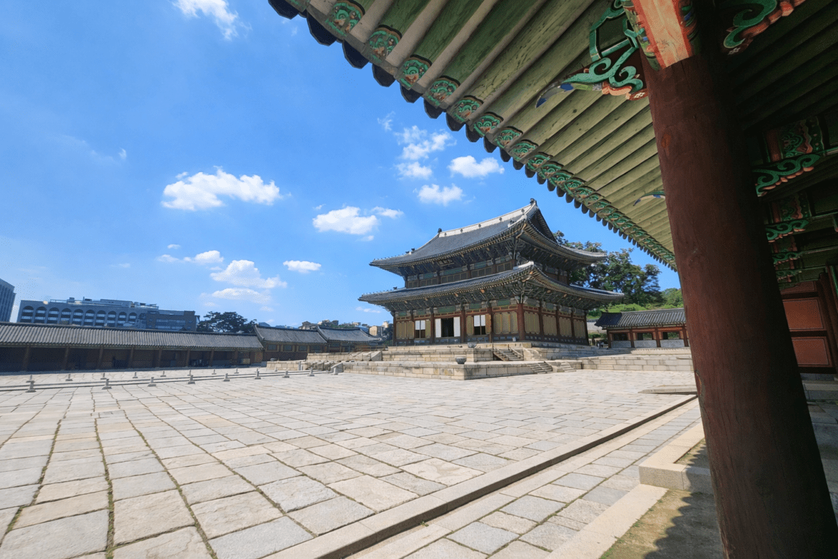 spring cycle meaning in astrology — Gyeongbokgung palace courtyard opening wide under bright spring sky
