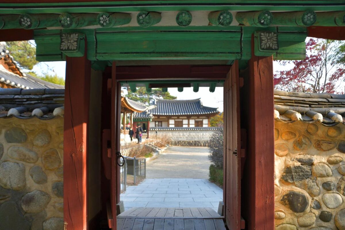Korean temple gateway entrance representing the threshold between human design and K-Saju understanding where two timing systems integrate
