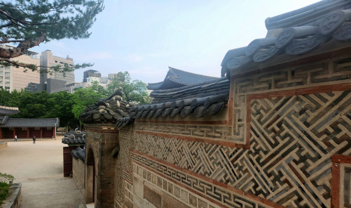 midnight hour meaning in astrology — a palace tile wall patterned with geometric restraint