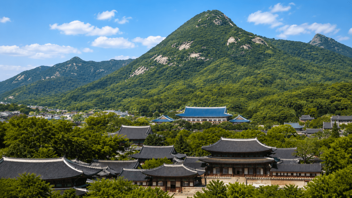 Bugaksan rising behind the palace rooftops it was chosen to protect, the mountain at the back.