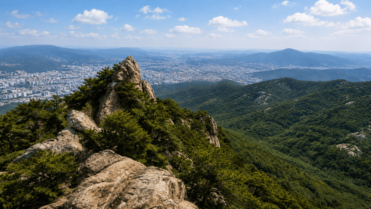 Rocky ridge on Gwanaksan overlooking the dense sprawl of southern Seoul, the daily mountain.