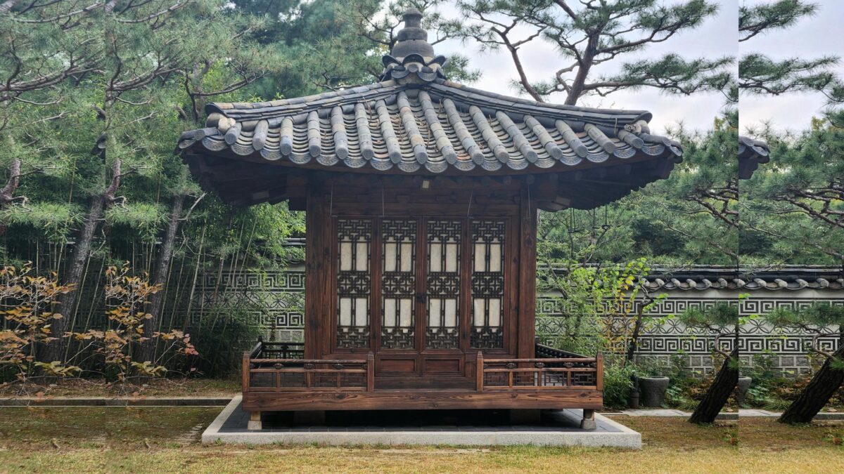 A solitary pavilion surrounded by trees and bamboo, representing the avoidant attachment style’s preference for emotional distance and self-reliance.
