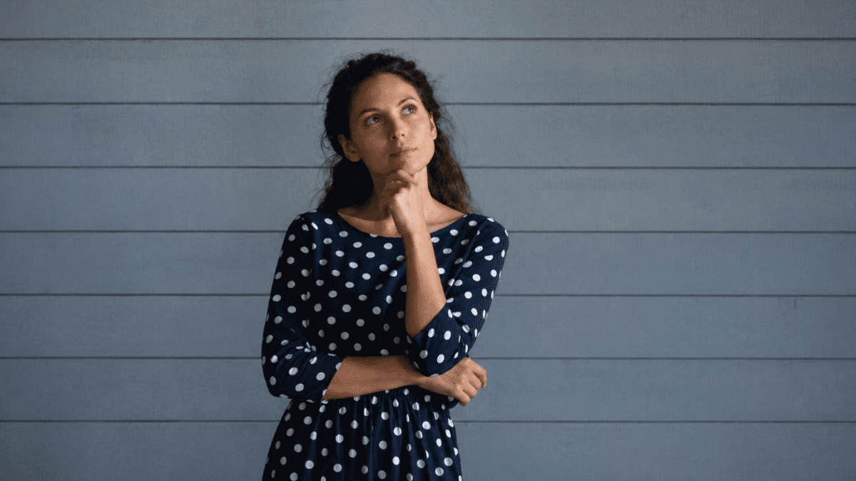 A woman in contemplation representing complete self-understanding—showing how seeing both who you are and where you are together creates a fuller, three-dimensional picture of yourself.
