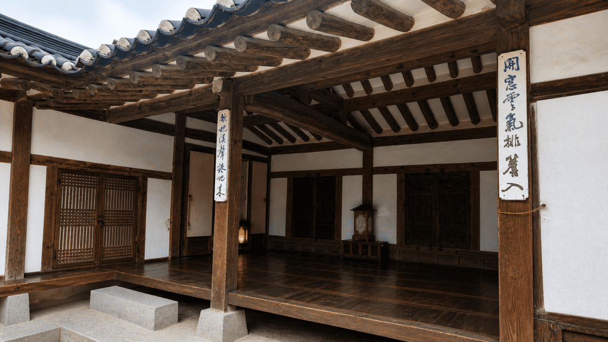Choi Seung-hee dance: Traditional Korean hanok with wooden veranda and tiled roof reflecting classic Korean architecture.