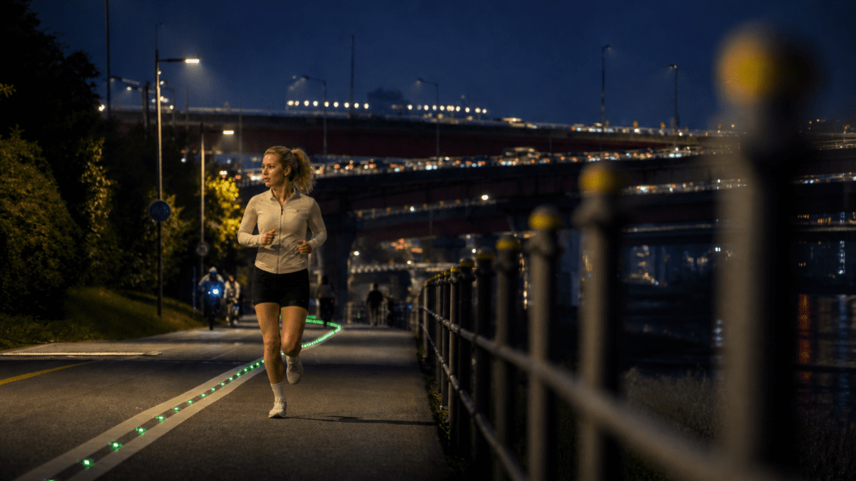 Woman jogging alone at 2 AM in Seoul - safe Korean nightlife scene with city lights and Han River