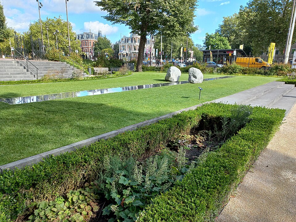 Lee Ufan silence installation with two stones and reflective water in an Amsterdam garden park