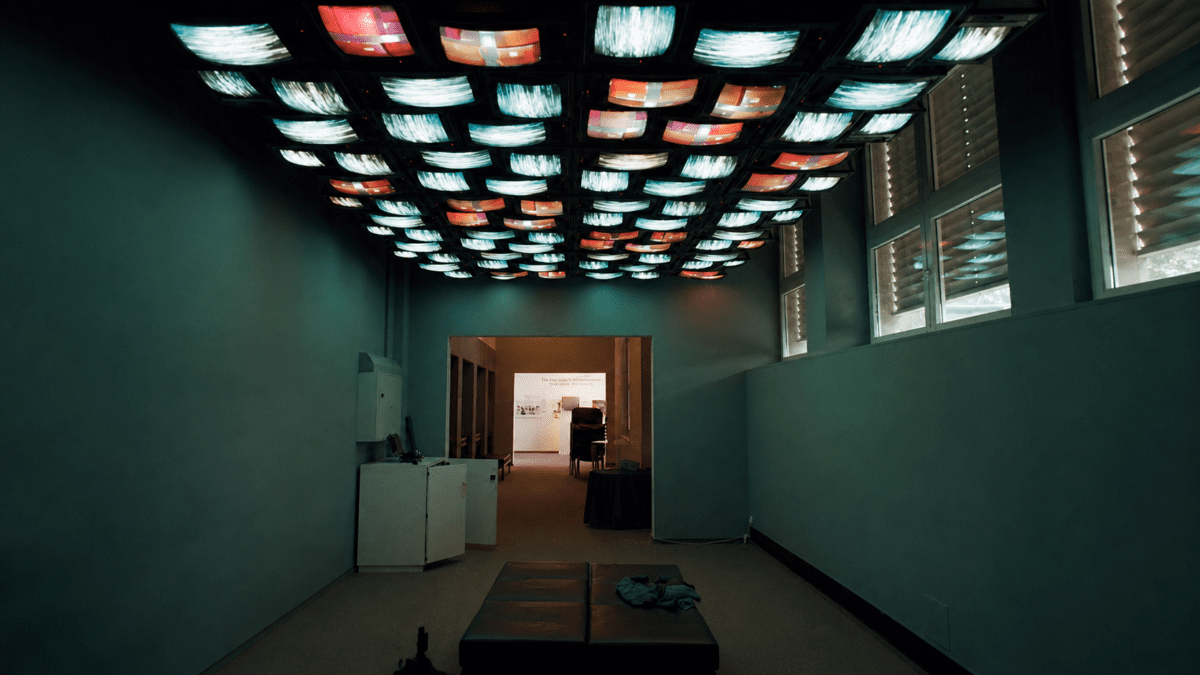 Immersive video installation inspired by Nam June Paik using multiple television screens and electronic light