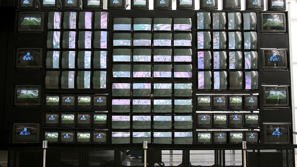 Nam June Paik television as art installation made from stacked CRT screens and moving video images