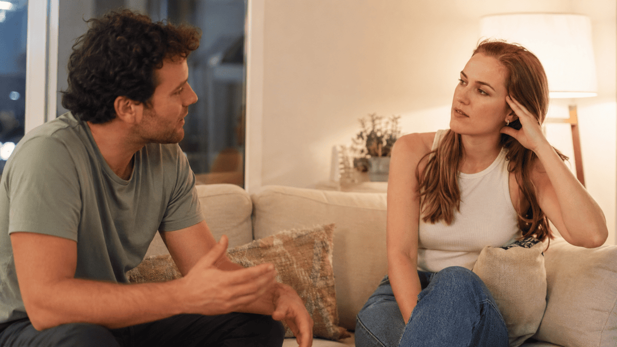 Woman mid-argument recognizing the same fight repeating—the moment of realizing your argument pattern in the middle of saying it